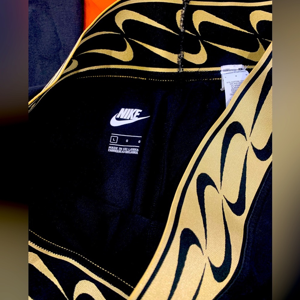 Nike black and gold leggings size large